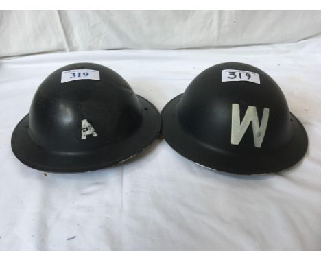  Sale Item:    2 METAL HELMETS A &amp; W   Vat Status:   No Vat   Buyers Premium:  This lot is subject to a Buyers Premium of
