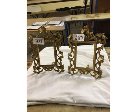  Sale Item:    PAIR GILT METAL FRAMES   Vat Status:   No Vat   Buyers Premium:  This lot is subject to a Buyers Premium of 15
