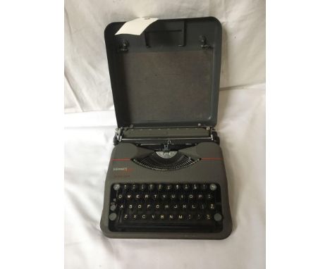  Sale Item:    HERMES BABY TYPEWRITER (AF)   Vat Status:   No Vat   Buyers Premium:  This lot is subject to a Buyers Premium 