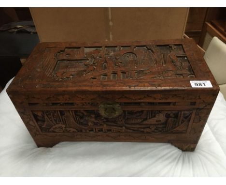  Sale Item:    SMALL CARVED ORIENTAL TRUNK   Vat Status:   No Vat   Buyers Premium:  This lot is subject to a Buyers Premium 