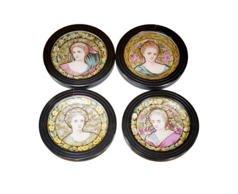 A set of four Copeland Spode Aesthetic period, outside decorated four seasons portrait plates, circa 1880, housed in ebonised