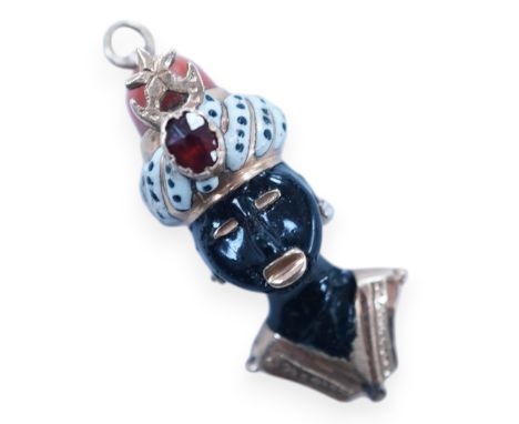 A yellow metal, enamel gem and coral bead set blackamoor bust charm, 32mm. Condition - poor