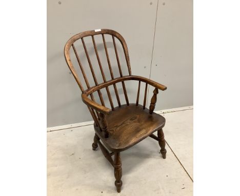 A 19th century ash and elm Windsor comb back child's chair, width 43cm, depth 32cm, height 77cm. Condition - fair