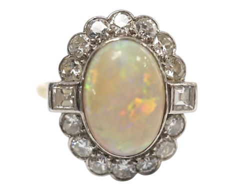 A mid 20th century 18ct, white opal, square and round cut diamond set oval cluster ring, size O, gross weight 3.3 grams. Cond