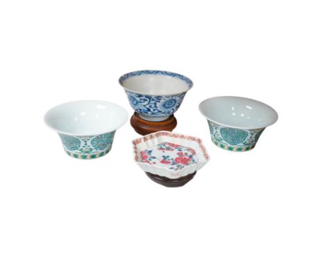 A Chinese blue and white bowl, Kangxi, 15cm. diam., a famille rose teapot stand, Yongzheng, and two doucai bowls. Condition -