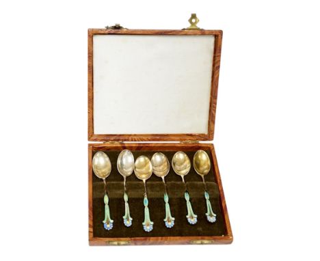 A cased harlequin set of six George VI silver gilt and three colour enamel set coffee spoons, Turner &amp; Simpson, Birmingha