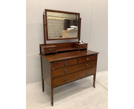 An Edwardian inlaid mahogany dressing chest, width 107cm, depth 50cm, height 156cm. Condition - fairProvenance: Constables To
