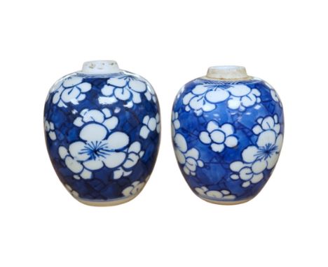 Two small Chinese blue and white prunus jars, Kangxi period, tallest 9.5cm. Condition - good