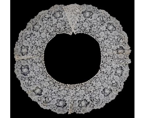 An 1860’s unused, large circular flounce shaped collar of mixed Brussels bobbin lace, with twelve needle lace Point de Gaz in