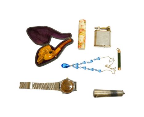 A small group of collectables including a cased Meerschaum pipe, a Dunhill lighter, a yellow metal mounted nephrite pendant, 