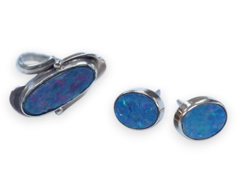 A 9ct and opal doublet ring and a pair of similar earrings, gross weight 4.8 grams. Condition - poor