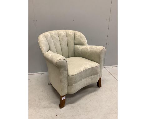 An Art Deco style upholstered tub shaped armchair, width 70cm, depth 68cm, height 76cm. Condition - fairProvenance: Constable