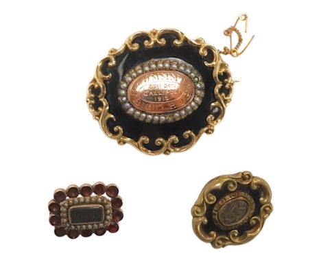 Three assorted late 19th/early 20th century yellow metal mounted mourning brooches, including black enamel and split pearl in