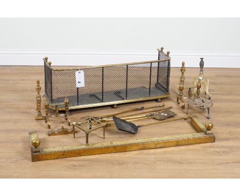 A VICTORIAN  BRASS AND WIRE MESH FENDER (15)On bun feet, 38cm wide; together with another fender, two pairs of brass andirons