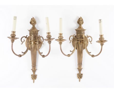 A SET OF FOUR EMPIRE STYLE GILT-METAL TWIN LIGHT WALL APPLIQUES (4)Modern
Fluted tapering flaming torch backplates with pierc