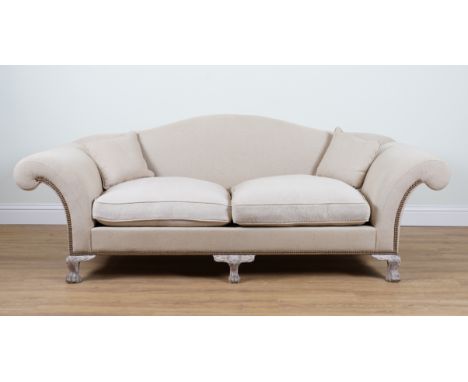 A CREAM UPHOLSTERED HUMPBACK SOFA230cm wide; 85cm high