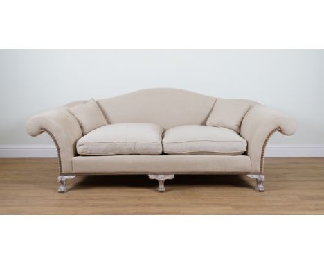 A CREAM UPHOLSTERED HUMPBACK SOFA230cm wide; 85cm high