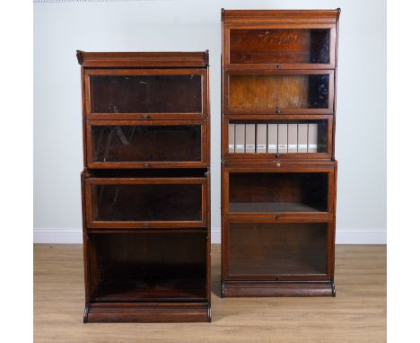 A TWO GLOBE WERNICKE STYLE OAK FIVE TIER BOOKCASES (2)87cm wide; 40cm deep; 215cm highAll glass doors present with this lot O