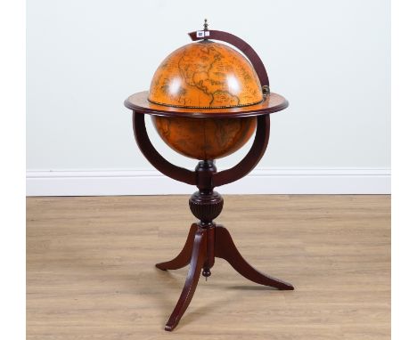 A 20TH CENTURY MAHOGANY FRAMED GLOBE DRINKS CABINET65 cm wide; 110cm highVery good overall condition, two small marks to the 