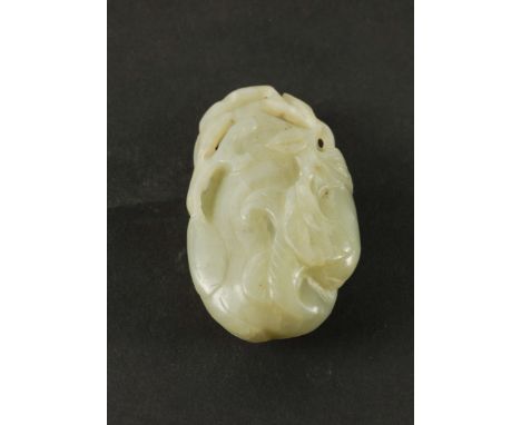 A CHNESE JADE CARVING OF A GOURDQing dynasty
Carved with leaves and branches, the stone of celadon tone, 6.5cm highTiny nick 