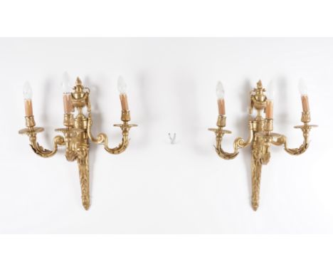 A SET OF FOUR LOUIS XVI STYLE GILT-METAL THREE LIGHT WALL APPLIQUES (4)Modern
Each tapering backplate surmounted by a laurel 