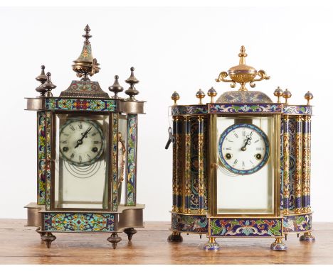 TWO CHINESE CLOISONNE ENAMEL MANTEL CLOCKS (2)Modern
The first gilt-metal and blue enamelled case surmounted by an urn finial