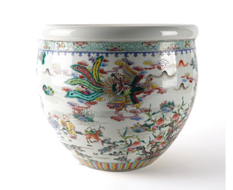 A CHINESE FAMILLE ROSE JARDINIEREModern
Painted with the Immortals and boys in a landscape, blue apochryphal Kangxi mark, 33c