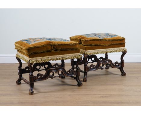 A PAIR OF EARLY 17TH CENTURY STYLE TAPESTRY UPHOLSTERED FOOTSTOOLS (2)with antique Flemis tapestry fragments  
63cm wide; 53c