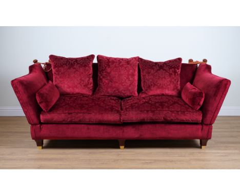 POSSIBLY DURESTA: A RED UPHOLSTERED DROP END KNOLL SOFA250cm wide; 100cm high