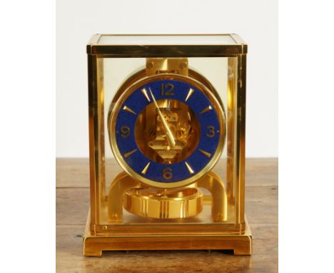 A SWISS JAEGER-LECOULTRE ATMOS MANTEL CLOCKSerial number 523100 Calibre 528-6, the blue chapter ring with gilt Arabic numeral