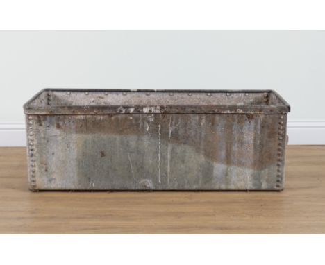 AN EARLY 20TH CENTURY GALVANISED RIVETED RECTANGULAR TROUGH125cm wide; 48cm deep; 42cm highProvenance: The selected contents 
