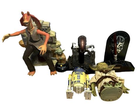 A collection of vintage Star Wars: Episode I electric toys, including Dancing Jar Jar Binks, Darth Maul clock etc