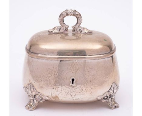 A German silver tea caddy, stamped marks: monogrammed and dated, of rectangular outline, the domed hinged lid with foliate an