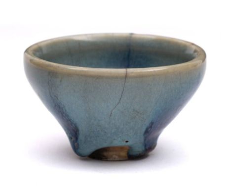 A small Chinese Jun ware bowl: with slightly incurved rim, covered in a thick crackled purple and light blue glaze, thinning 
