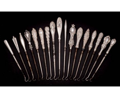 A collection of seventeen assorted small silver-handled button hooks, various makers and dates: with steel shaft and hook, va