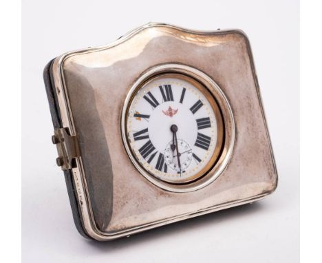 A large steel cased pocket watch: with 5.75cm enamel Roman dial with subsidiary seconds dial, contained in a silver travellin