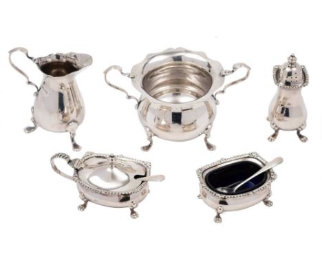 An Elizabeth II silver three-piece cruet set, maker Elkington &amp; Co, Birmingham, 1966: with gadrooned borders, raised on p