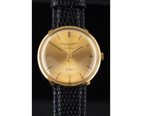 International Watch Co., an 18ct gents wristwatch: the round 'gold' dial with black Roman numerals signed International Watch