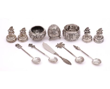 A mixed lot of Burmese and Indo-Persian silverwares: includes menu holders, napkin ring, salt, pepperette, spoons etc, total 