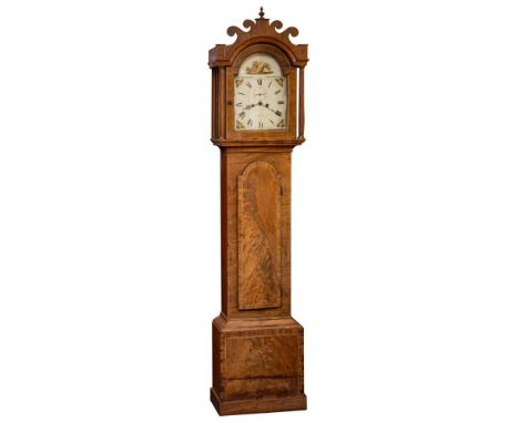 A George III mahogany longcase clock: the eight-day duration movement striking the hours on a bell with brass-bound weights, 