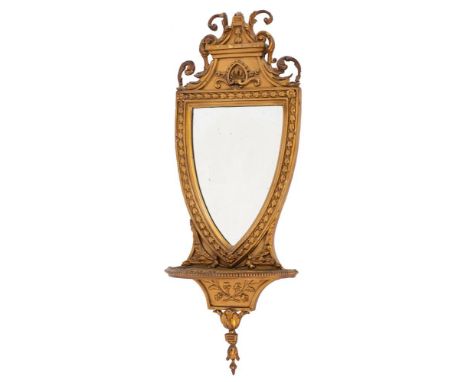 A Victorian giltwood and composition framed wall mirror in Neoclassical taste, circa 1880,: the pediment with scrolling folia