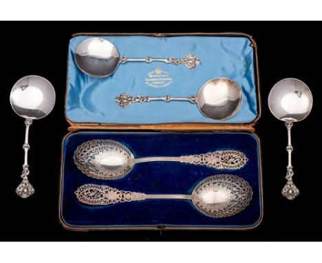 A pair of Victorian silver serving spoons, maker Goldsmiths &amp; Silversmiths Co, London, 1899: with pierced decorated stems