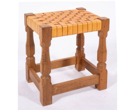 Workshop of Robert 'Mouseman' Thompson (Kilburn), an English oak stool,: with woven leather strapwork seat, on octagonal sect