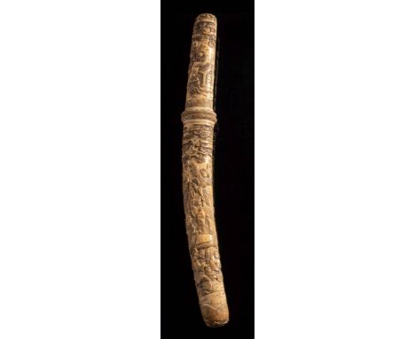 A Japanese tanto: the ivory scabbard, handle and guard carved in the round with officials and numerous figures in garden sett