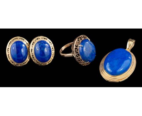 A lapis lazuli ring,: the oval cabochon lapis lazuli in a four claw setting, within a pierced surround, stamped 14k, ring siz