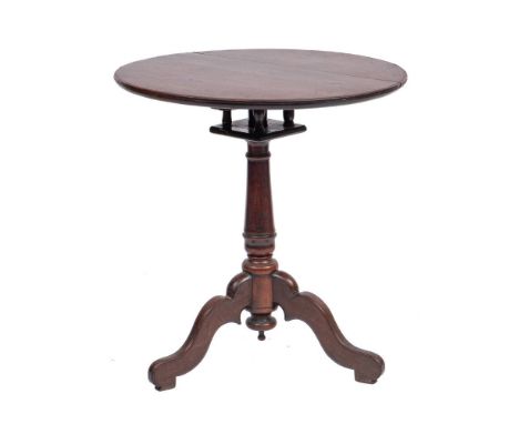 A late George II mahogany tripod table, mid 18th century,: the circular hinged top and 'birdcage action' above a turned colum