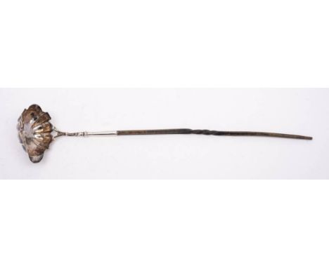 A George III silver toddy ladle, maker NS &amp; AN, London, 1766: the oval lobed-shaped bowl with lip mounted on a spiral twi