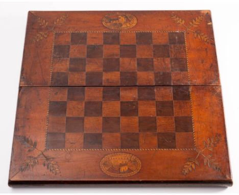 A 19th century Irish Killarney ware and inlaid folding chess board: with inlaid medallions of Muckross Abbey and Ross Castle,