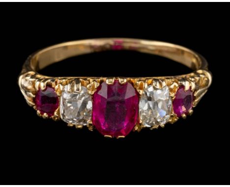 A ruby and diamond ring,: the rectangular cut ruby claw set between two old cut diamonds and two square cut rubies, stamped 1