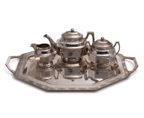 A silver three-piece tea service with matching tray, possibly Chinese, bears Austro-Hungarian import marks for 800 standard s